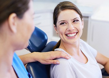 Smiling woman in dental chair