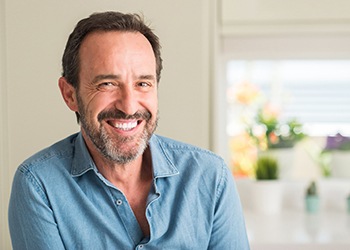 man smiling with dental bridge in South Windsor