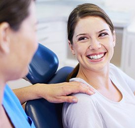 Smiling woman in dental chair