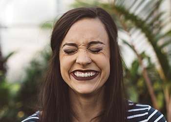 Laughing woman outdoors