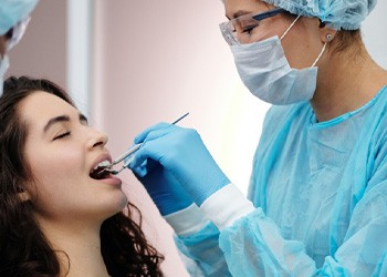 Woman having root canal procedure