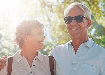 Senior couple smiling outdoors