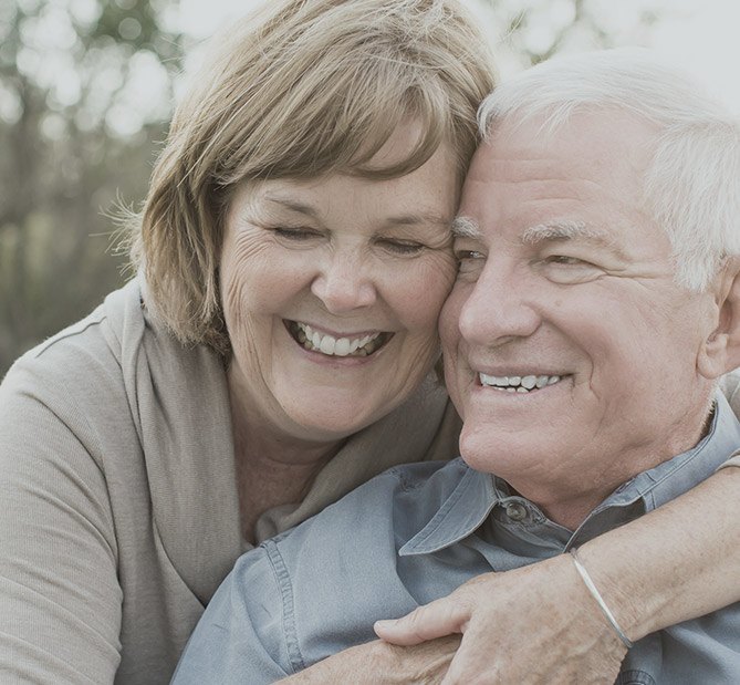 Smiling senior couple outdoors