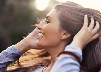 Smiling woman outdoors