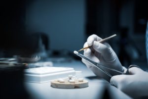 a dental lab technician crafted a dental crown